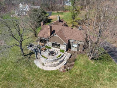 Discover extraordinary craftsmanship and authentic architecture on Birchwood Farms Golf and Country Club in Michigan - for sale on GolfHomes.com, golf home, golf lot