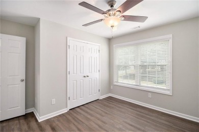 Stunning stucco home in the highly sought-after Summer Grove on Summergrove Golf Club in Georgia - for sale on GolfHomes.com, golf home, golf lot
