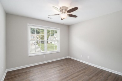 Stunning stucco home in the highly sought-after Summer Grove on Summergrove Golf Club in Georgia - for sale on GolfHomes.com, golf home, golf lot