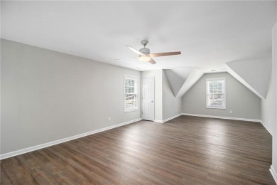 Stunning stucco home in the highly sought-after Summer Grove on Summergrove Golf Club in Georgia - for sale on GolfHomes.com, golf home, golf lot