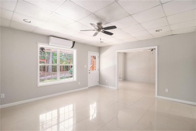 Stunning stucco home in the highly sought-after Summer Grove on Summergrove Golf Club in Georgia - for sale on GolfHomes.com, golf home, golf lot