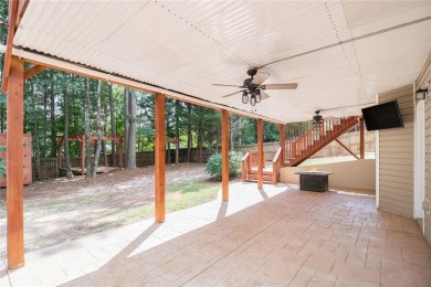Stunning stucco home in the highly sought-after Summer Grove on Summergrove Golf Club in Georgia - for sale on GolfHomes.com, golf home, golf lot