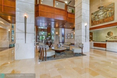 GORGEOUS UNIT AT TURNBERRY ON THE GREEN OVERLOOKING THE CITY OF on Turnberry Isle Resort and Club in Florida - for sale on GolfHomes.com, golf home, golf lot