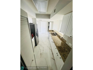 GORGEOUS UNIT AT TURNBERRY ON THE GREEN OVERLOOKING THE CITY OF on Turnberry Isle Resort and Club in Florida - for sale on GolfHomes.com, golf home, golf lot