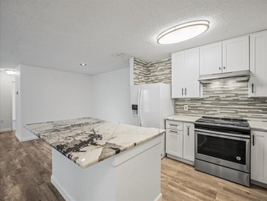 Beautifully updated 2 bedroom, 2 bath condo with a large balcony on Hunters Green Country Club in Florida - for sale on GolfHomes.com, golf home, golf lot