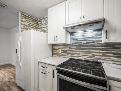 Beautifully updated 2 bedroom, 2 bath condo with a large balcony on Hunters Green Country Club in Florida - for sale on GolfHomes.com, golf home, golf lot