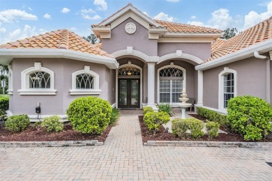 STUNNING POOL HOME located in the prestigious Lake Jovita Golf on Lake Jovita Golf and Country Club in Florida - for sale on GolfHomes.com, golf home, golf lot