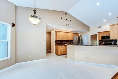 Set on a serene conservation lot, this beautifully maintained on Countryway Golf Course in Florida - for sale on GolfHomes.com, golf home, golf lot