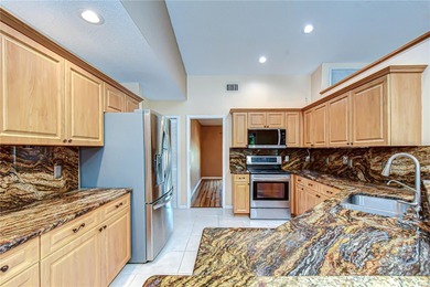 Set on a serene conservation lot, this beautifully maintained on Countryway Golf Course in Florida - for sale on GolfHomes.com, golf home, golf lot