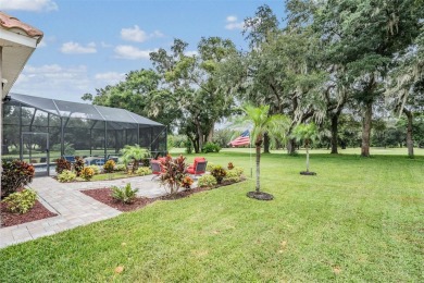 STUNNING POOL HOME located in the prestigious Lake Jovita Golf on Lake Jovita Golf and Country Club in Florida - for sale on GolfHomes.com, golf home, golf lot