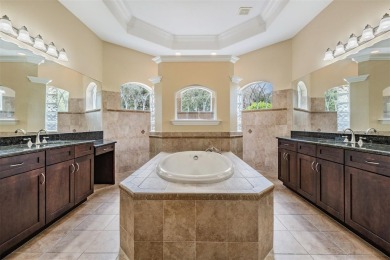 STUNNING POOL HOME located in the prestigious Lake Jovita Golf on Lake Jovita Golf and Country Club in Florida - for sale on GolfHomes.com, golf home, golf lot