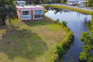 LAKE VIEWS!! Beautiful Private Corner Unit Light and Bright 2 on Addison Reserve in Florida - for sale on GolfHomes.com, golf home, golf lot