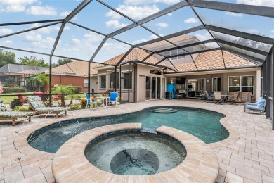 STUNNING POOL HOME located in the prestigious Lake Jovita Golf on Lake Jovita Golf and Country Club in Florida - for sale on GolfHomes.com, golf home, golf lot