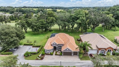 STUNNING POOL HOME located in the prestigious Lake Jovita Golf on Lake Jovita Golf and Country Club in Florida - for sale on GolfHomes.com, golf home, golf lot