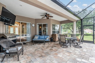 STUNNING POOL HOME located in the prestigious Lake Jovita Golf on Lake Jovita Golf and Country Club in Florida - for sale on GolfHomes.com, golf home, golf lot