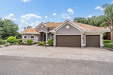 STUNNING POOL HOME located in the prestigious Lake Jovita Golf on Lake Jovita Golf and Country Club in Florida - for sale on GolfHomes.com, golf home, golf lot