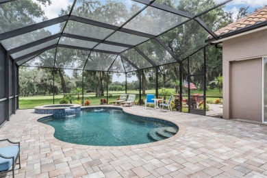 STUNNING POOL HOME located in the prestigious Lake Jovita Golf on Lake Jovita Golf and Country Club in Florida - for sale on GolfHomes.com, golf home, golf lot