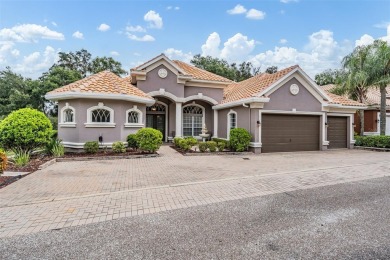 STUNNING POOL HOME located in the prestigious Lake Jovita Golf on Lake Jovita Golf and Country Club in Florida - for sale on GolfHomes.com, golf home, golf lot