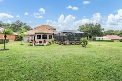 STUNNING POOL HOME located in the prestigious Lake Jovita Golf on Lake Jovita Golf and Country Club in Florida - for sale on GolfHomes.com, golf home, golf lot