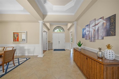 Driving through the gates of prestigious Country Club East, you on Ritz-Carlton Members Golf Club in Florida - for sale on GolfHomes.com, golf home, golf lot