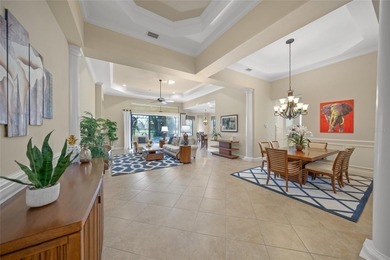 Driving through the gates of prestigious Country Club East, you on Ritz-Carlton Members Golf Club in Florida - for sale on GolfHomes.com, golf home, golf lot