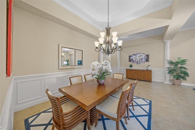 Driving through the gates of prestigious Country Club East, you on Ritz-Carlton Members Golf Club in Florida - for sale on GolfHomes.com, golf home, golf lot