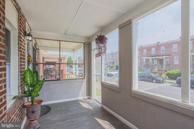 This charming end-of-row townhouse, built in 1924, seamlessly on Clifton Park Golf Course in Maryland - for sale on GolfHomes.com, golf home, golf lot
