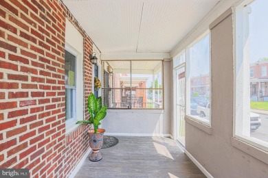 This charming end-of-row townhouse, built in 1924, seamlessly on Clifton Park Golf Course in Maryland - for sale on GolfHomes.com, golf home, golf lot