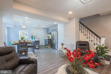 This charming end-of-row townhouse, built in 1924, seamlessly on Clifton Park Golf Course in Maryland - for sale on GolfHomes.com, golf home, golf lot