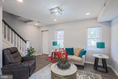 This charming end-of-row townhouse, built in 1924, seamlessly on Clifton Park Golf Course in Maryland - for sale on GolfHomes.com, golf home, golf lot