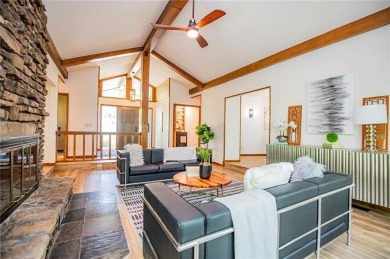 This exquisite, partially-wooded Mid Century Modern Ranch style on Fayetteville Country Club in Arkansas - for sale on GolfHomes.com, golf home, golf lot