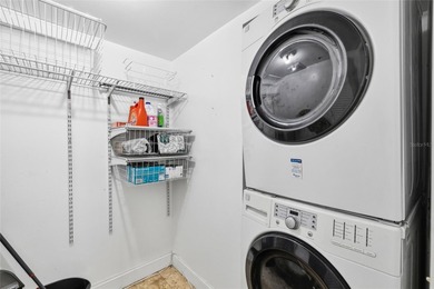 Live where the golf course meets the coast! This stunningly on Feather Sound Country Club in Florida - for sale on GolfHomes.com, golf home, golf lot