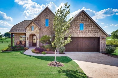 Elegant 1.5-story home at 2000 Fox Bend Trace in the Bridges at on The Bridges Golf Club in Texas - for sale on GolfHomes.com, golf home, golf lot