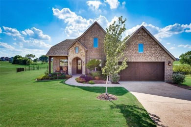 Elegant 1.5-story home at 2000 Fox Bend Trace in the Bridges at on The Bridges Golf Club in Texas - for sale on GolfHomes.com, golf home, golf lot