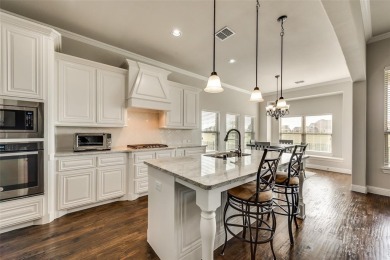 Elegant 1.5-story home at 2000 Fox Bend Trace in the Bridges at on The Bridges Golf Club in Texas - for sale on GolfHomes.com, golf home, golf lot