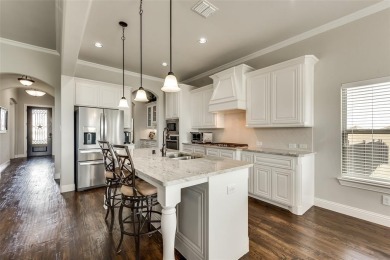 Elegant 1.5-story home at 2000 Fox Bend Trace in the Bridges at on The Bridges Golf Club in Texas - for sale on GolfHomes.com, golf home, golf lot