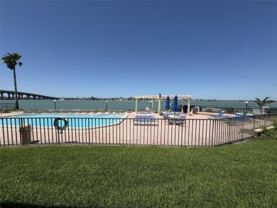 What can be better than walking out your back door, from your on Isla Del Sol Yacht and Country Club in Florida - for sale on GolfHomes.com, golf home, golf lot