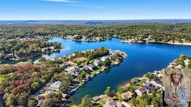 Water view sprawling ranch  home in beautiful Raintreee on Raintree Country Club in Missouri - for sale on GolfHomes.com, golf home, golf lot