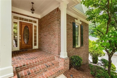 Nestled on a beautifully landscaped half-acre lot in on Chapel Hills Golf and Country Club in Georgia - for sale on GolfHomes.com, golf home, golf lot