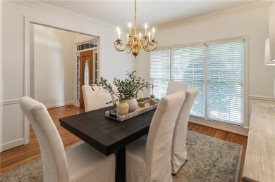 Nestled on a beautifully landscaped half-acre lot in on Chapel Hills Golf and Country Club in Georgia - for sale on GolfHomes.com, golf home, golf lot
