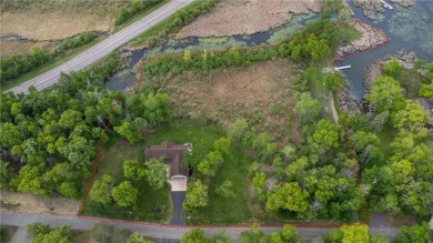 Escape to your own slice of paradise at 29235 Piney Way, a on Breezy Point Golf Course Resort in Minnesota - for sale on GolfHomes.com, golf home, golf lot