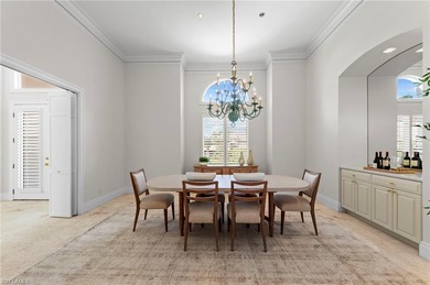 Experience timeless elegance and panoramic water views at 780 on Bentley Village Golf Course in Florida - for sale on GolfHomes.com, golf home, golf lot