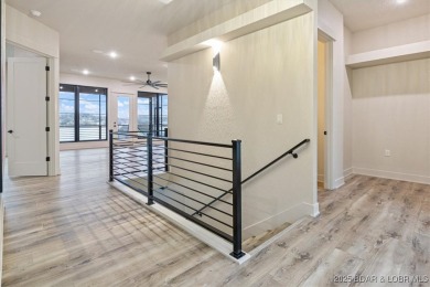 The stunning new construction in the highly sought after *Porto on The Club At Porto Cima in Missouri - for sale on GolfHomes.com, golf home, golf lot