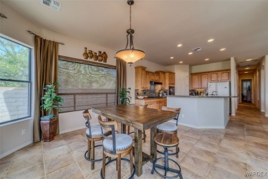 Imagine stepping into a stunning 3 bedroom 2 bath home nestled on Laughlin Ranch Golf Club in Arizona - for sale on GolfHomes.com, golf home, golf lot