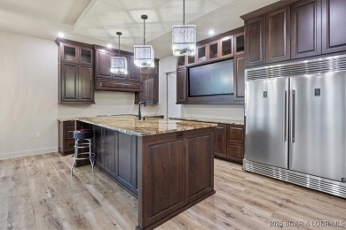 The stunning new construction in the highly sought after *Porto on The Club At Porto Cima in Missouri - for sale on GolfHomes.com, golf home, golf lot