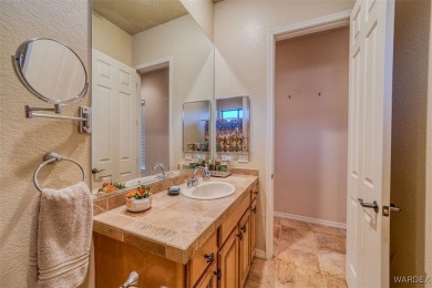 Imagine stepping into a stunning 3 bedroom 2 bath home nestled on Laughlin Ranch Golf Club in Arizona - for sale on GolfHomes.com, golf home, golf lot