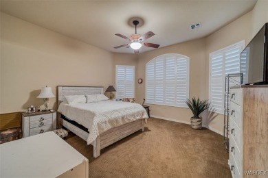 Imagine stepping into a stunning 3 bedroom 2 bath home nestled on Laughlin Ranch Golf Club in Arizona - for sale on GolfHomes.com, golf home, golf lot