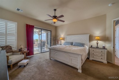 Imagine stepping into a stunning 3 bedroom 2 bath home nestled on Laughlin Ranch Golf Club in Arizona - for sale on GolfHomes.com, golf home, golf lot