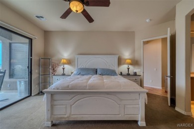 Imagine stepping into a stunning 3 bedroom 2 bath home nestled on Laughlin Ranch Golf Club in Arizona - for sale on GolfHomes.com, golf home, golf lot