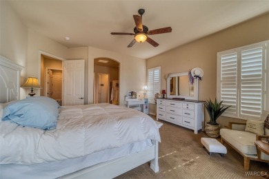 Imagine stepping into a stunning 3 bedroom 2 bath home nestled on Laughlin Ranch Golf Club in Arizona - for sale on GolfHomes.com, golf home, golf lot